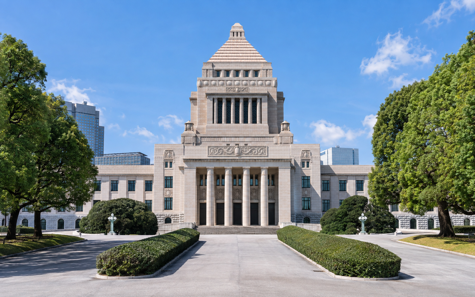 青空の下に立つ国会議事堂